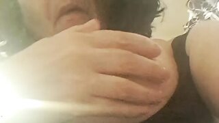 MILF in heat sucking her fingers from vaginal wetness