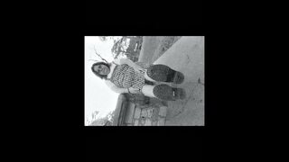 Nurse vicki models in her black and whot hogwarts outfit and spiked boots