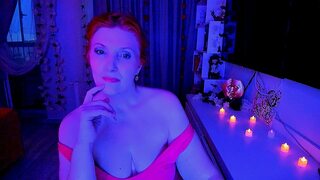 Redhead woman is moving under quite music