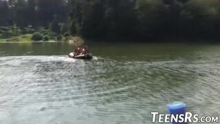 Group of naughty teens is having fun while swimming outdoor
