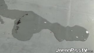 Handsome Japanese babes shower concrete with gold