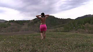 Beautiful mature booty on full display as she strips naked