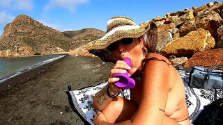 Blonde Mature Amateur Strokes Herself on Beach