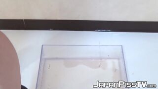 Naughty Japanese sweetie peeing through red panties