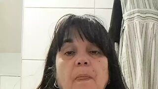 Mature cougar unleashing her beastly seduction to ravage tender nips