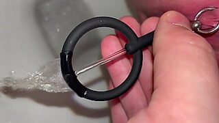 Dilator Insertion for Clitoral Urination Thrill